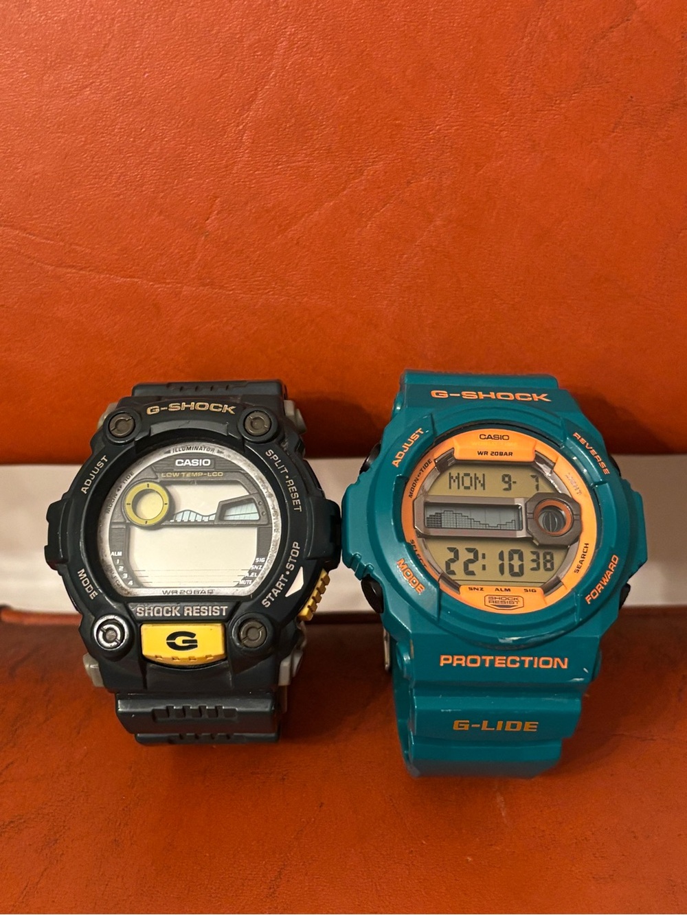 Casio G-Shock Black & Teal Digital Watch Pair with Orange Accents